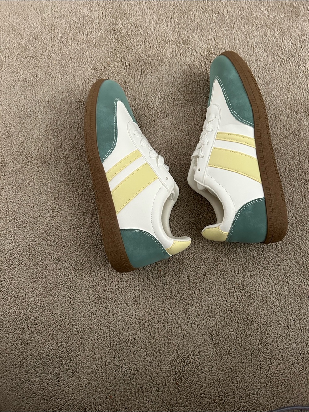 Casual White Sneakers with Teal and Pale Yellow Accents
